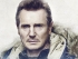 Liam Neeson as Nels Coxman staring intently